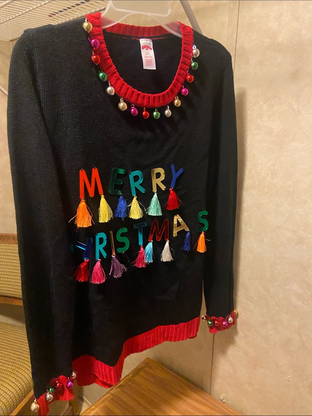 Holiday Time Black Crewneck Sweater with Red Trim and Multicolor Tassels